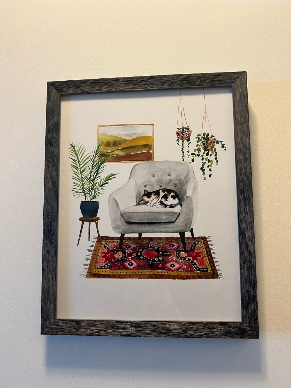 Framed Home Art Print - Gray Armchair with Cat in Red Rug